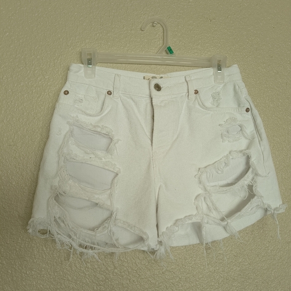 Free People Pants - Free People We The Free Maggie Mid-Rise Denim Distressed Shorts-White-Size 26